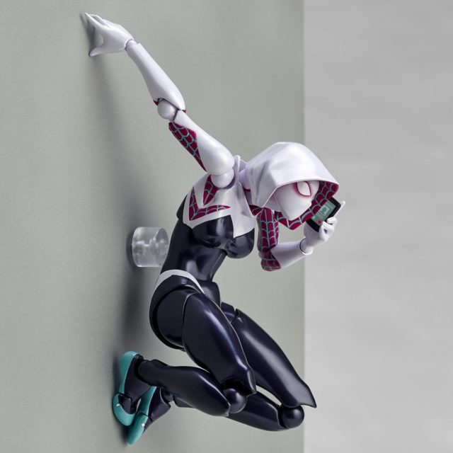 Amazing Yamaguchi Spider-Gwen Figure on Wall Talking on Cell Phone